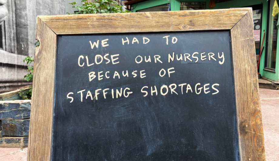 Chalk board saying 'we had to close our nursery because of staffing shortages'