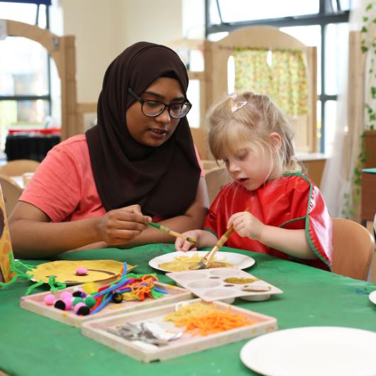 Staff and Children getting involved in painting and crafting