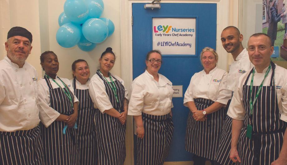 The chefs from the first cohort standing together for a photo during the Chef Academy Launch
