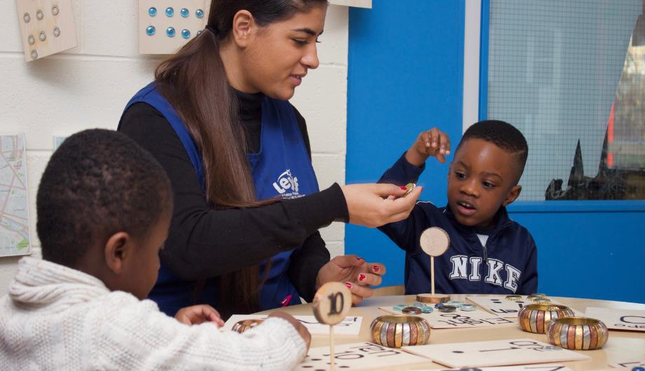 Staff and children using different items to learn how to count