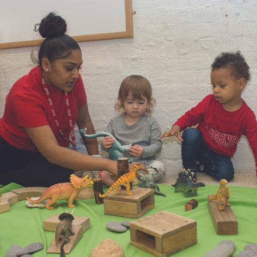 Children and teacher play with animal provocation