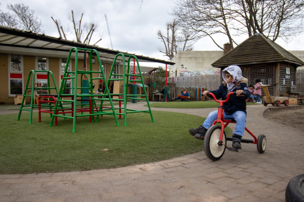 On a bike at LEYF Ford Road Nursery