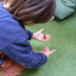 LEYF Marsham Street Garden child playing with butterfly