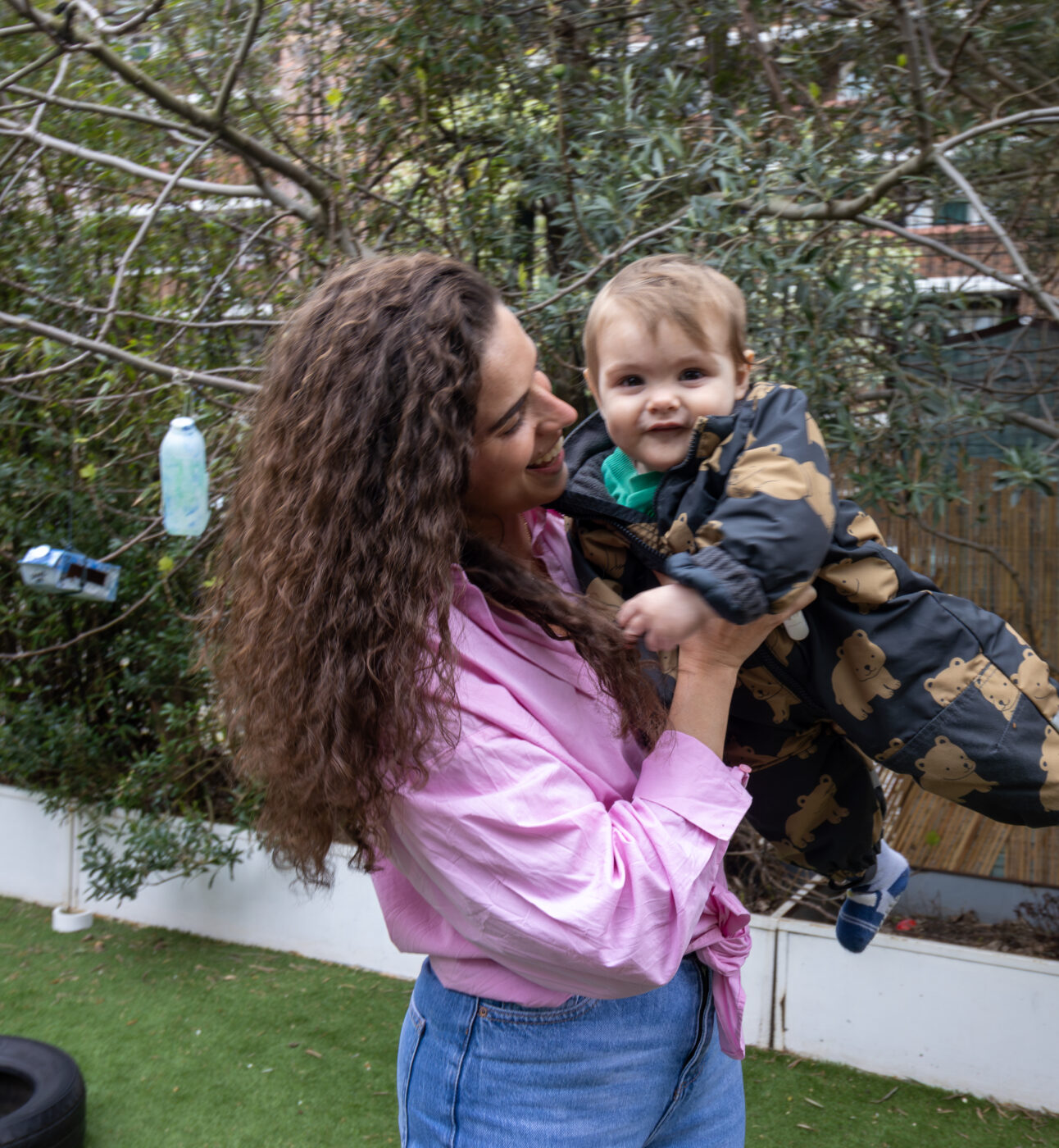 Pembury nursery school teacher playing with child