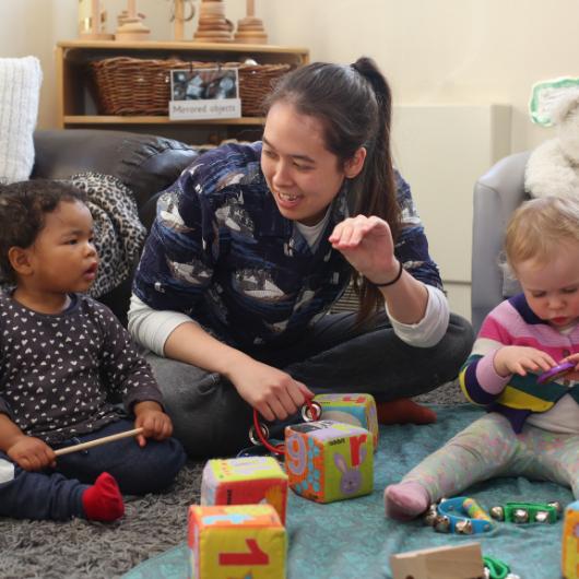 children playing on different instruments