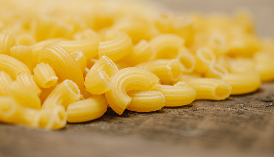 macaroni on a wooden board