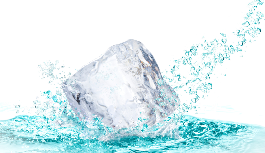 Ice cube and turquoise coloured water splash