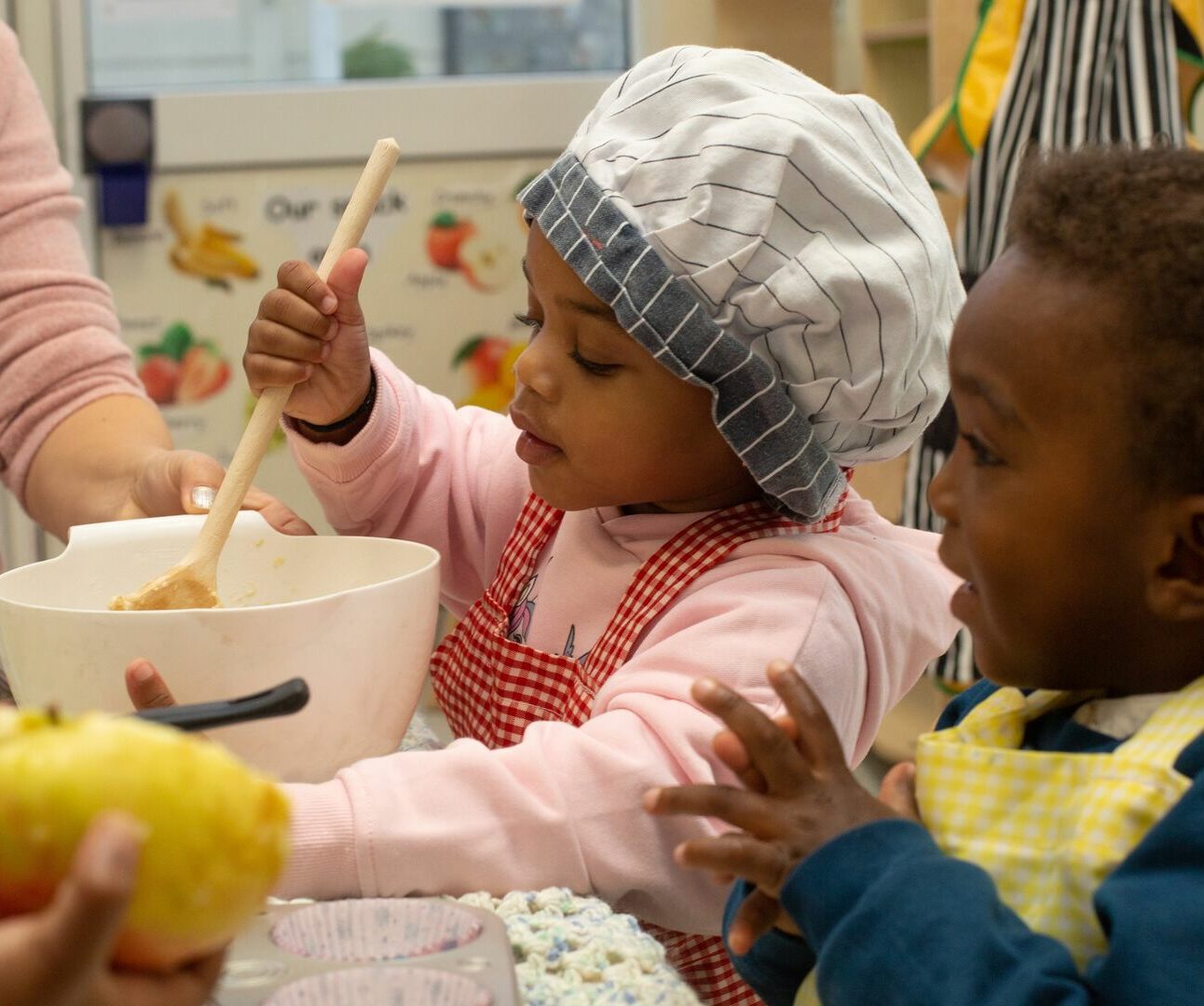 Children baking cupcakes