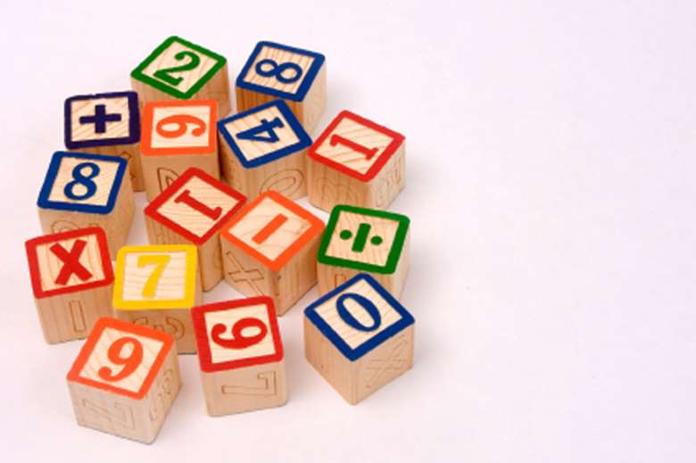 Photo of child coloured number blocks