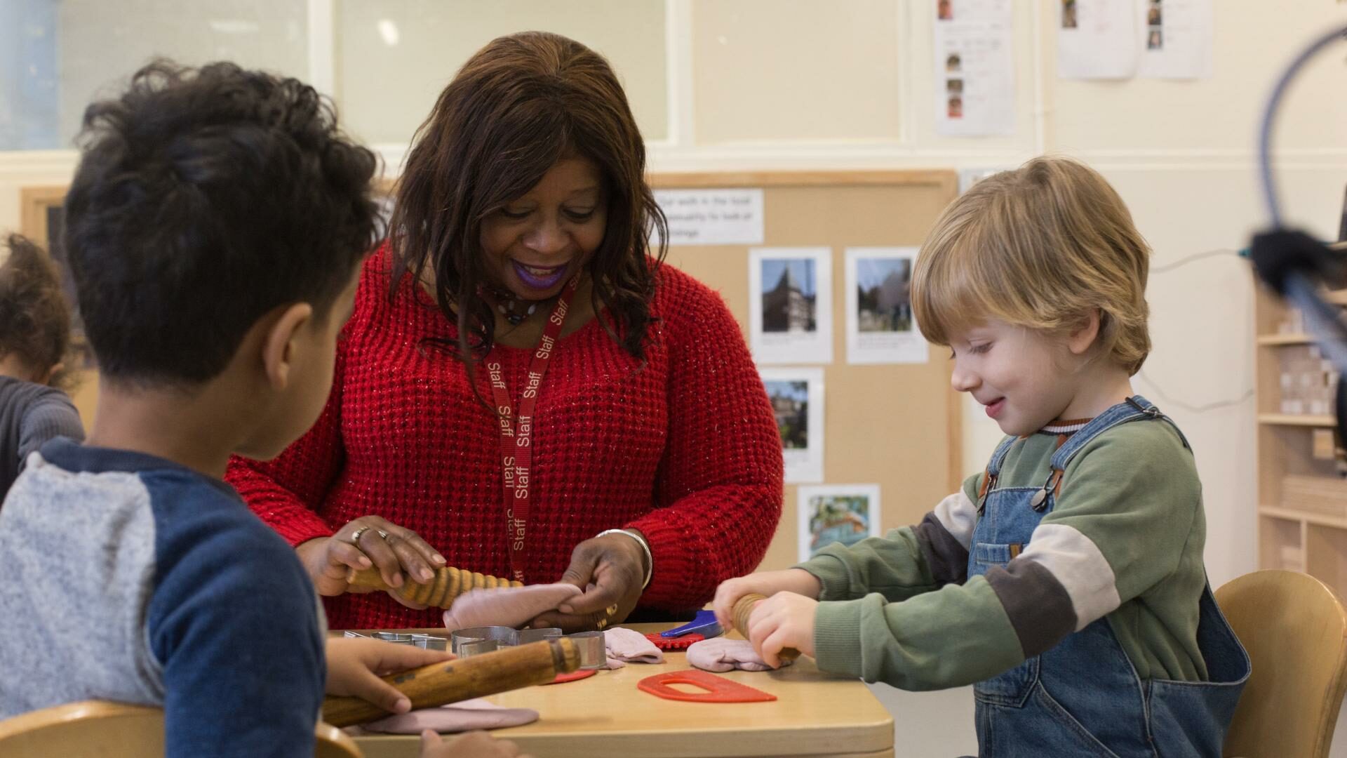 Staff and Child playing with playdough