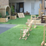 Various wooden structures in garden used for play