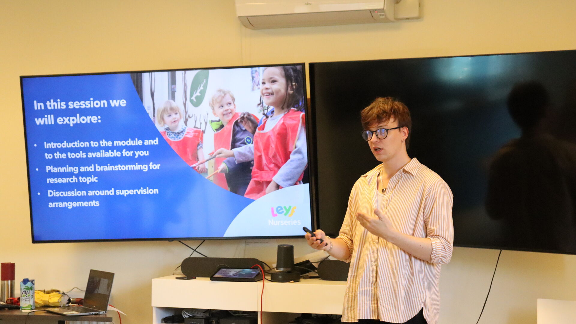 Training staff member presenting a training session