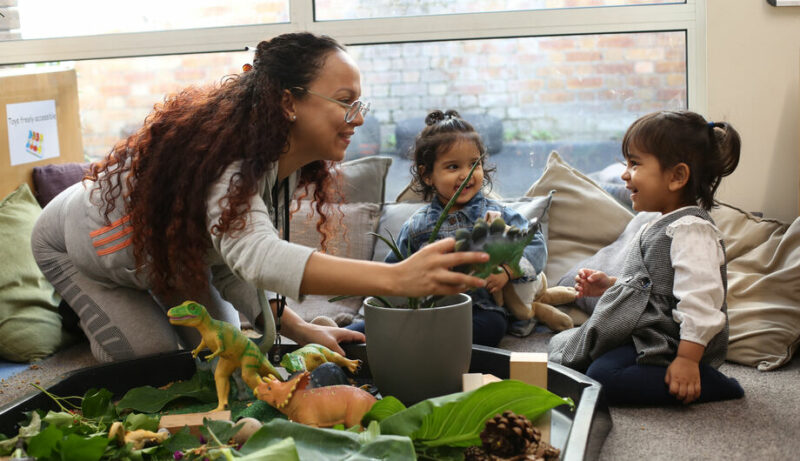 Children playing with dinosaurs at Farrance Road nursery