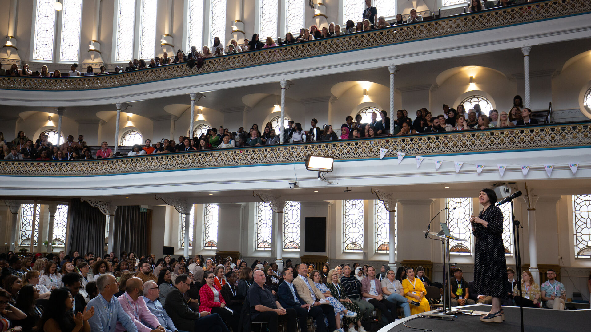 June givinh a speech at the LEYF Conference 2024