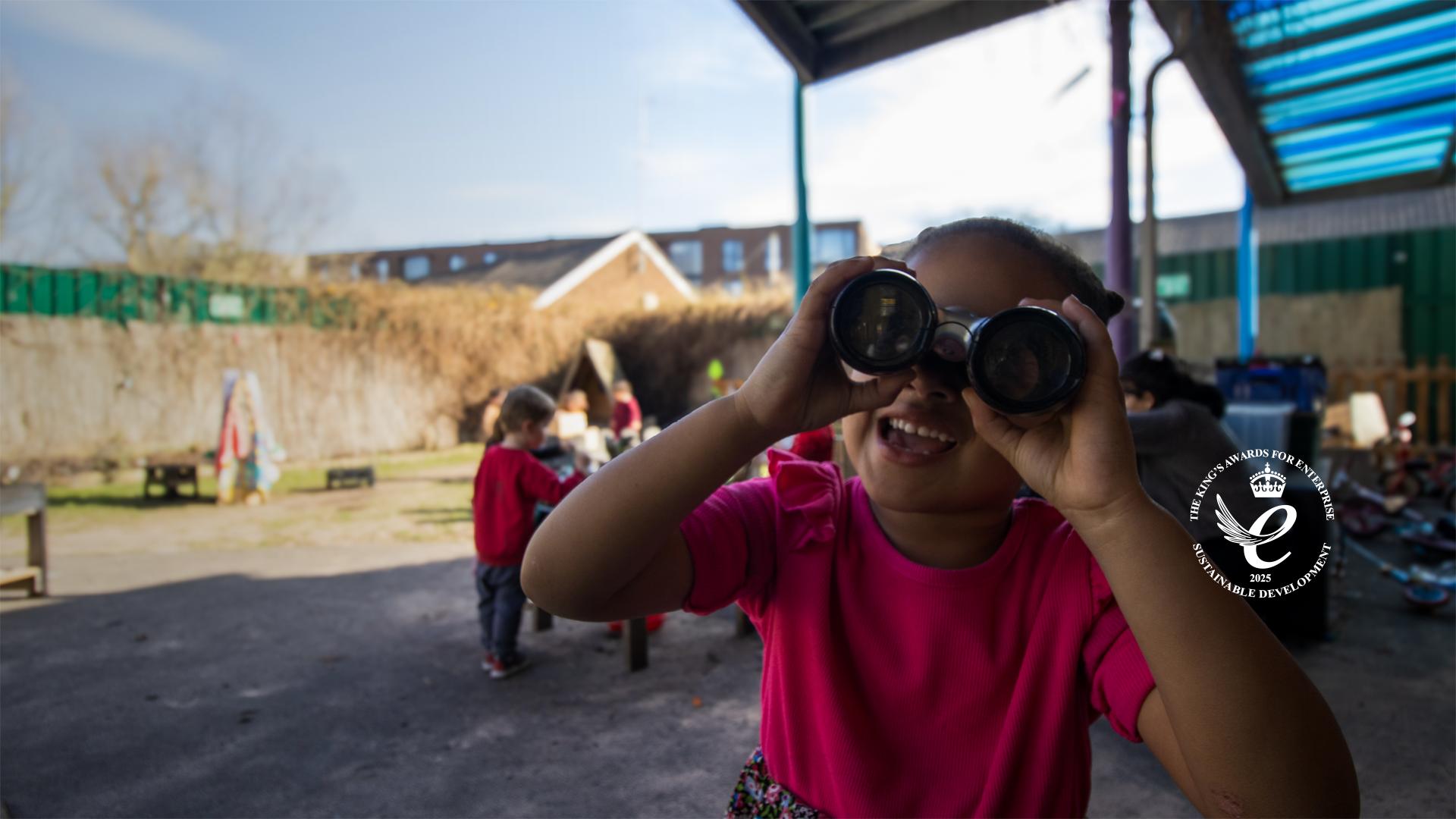 Preschooler looking through binoculars