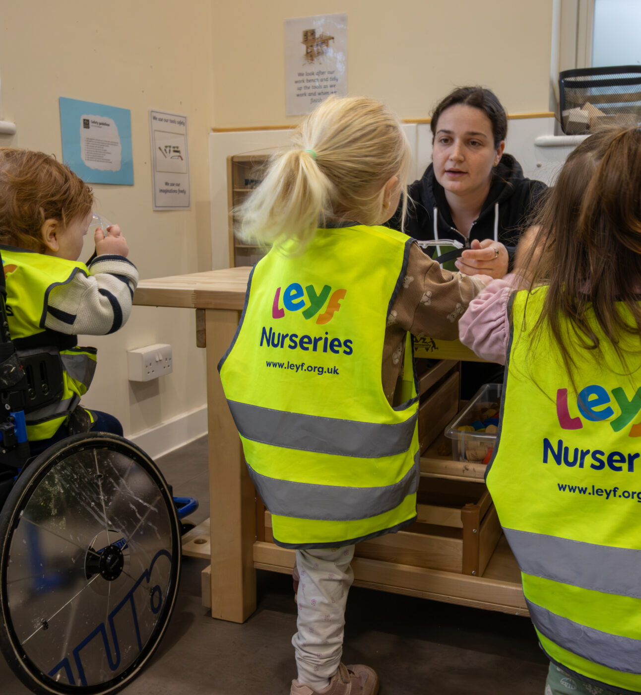 Leyf nursery children in florescent vests